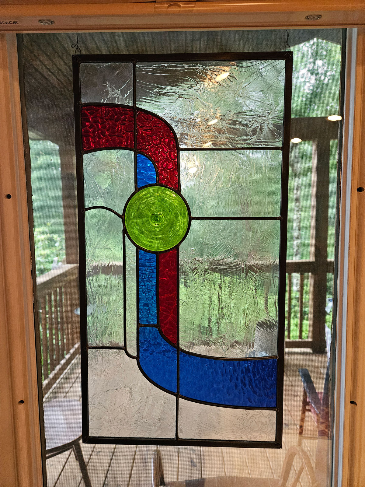 Abstract geometric stained glass panel